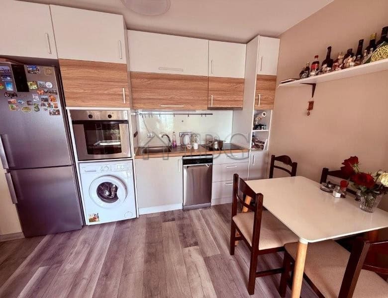 Bright sea view one-bedroom apartment kitchen in Sveti Vlas with contemporary design and essential a.