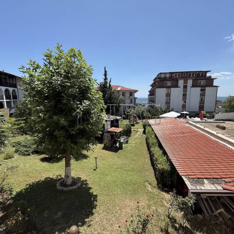 Bright 2-bedroom apartment in Vodenitsata Complex, Sveti Vlas, with garden views and modern amenitie.