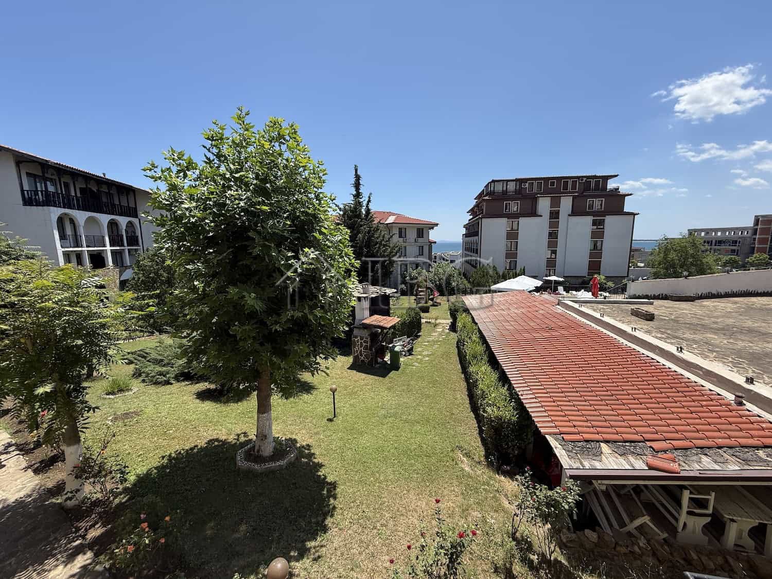 Bright 2-bedroom apartment in Vodenitsata Complex, Sveti Vlas, with garden views and modern amenitie.
