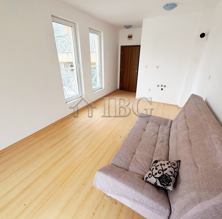 Bright studio apartment with balcony overlooking the pool, perfect for sunny beach days. Modern inte.