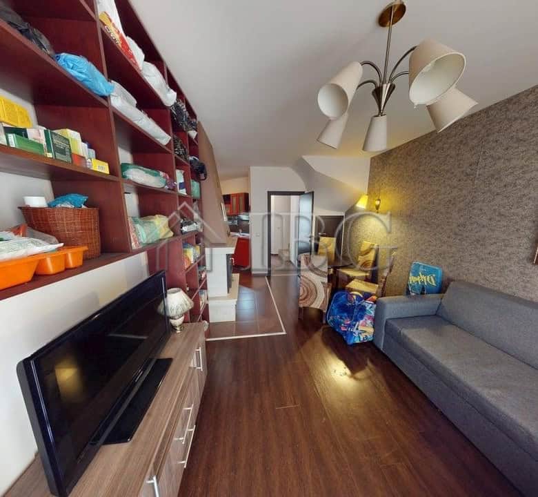 Spacious interior of a two-story maisonette in Imperial Heights, Kosharitsa, featuring modern furnis.