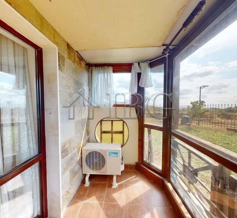 Balcony view of the two-story maisonette in Imperial Heights, Kosharitsa, with scenic countryside an.