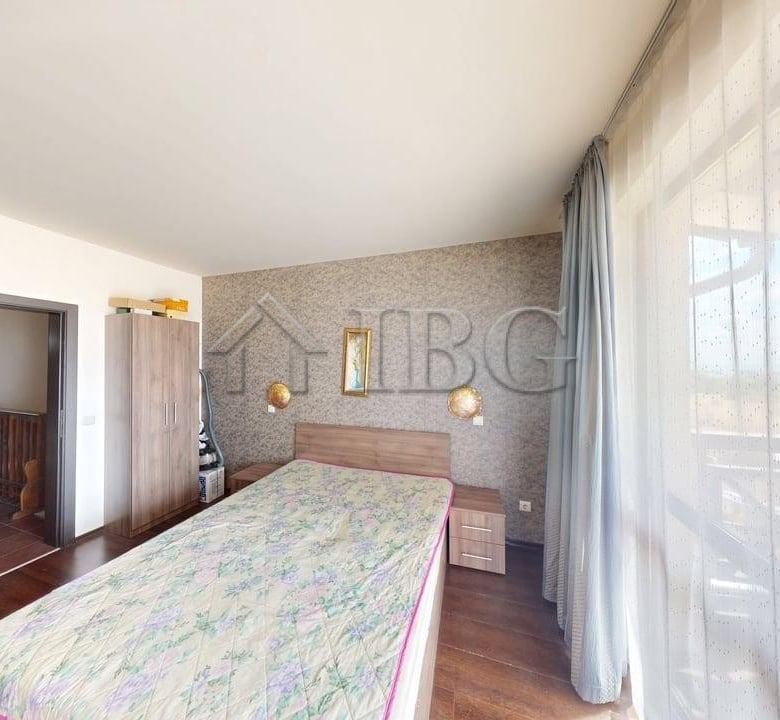 Interior view of a two-story maisonette in Imperial Heights, Kosharitsa, with a spacious bedroom and.