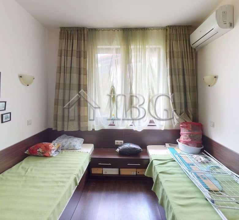 Spacious interior of a two-story maisonette in Imperial Heights, Kosharitsa, with large windows and.