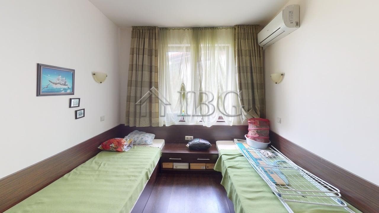 Spacious interior of a two-story maisonette in Imperial Heights, Kosharitsa, with large windows and.