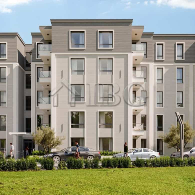 Modern residential building in Ravda with multiple floors and balconies.