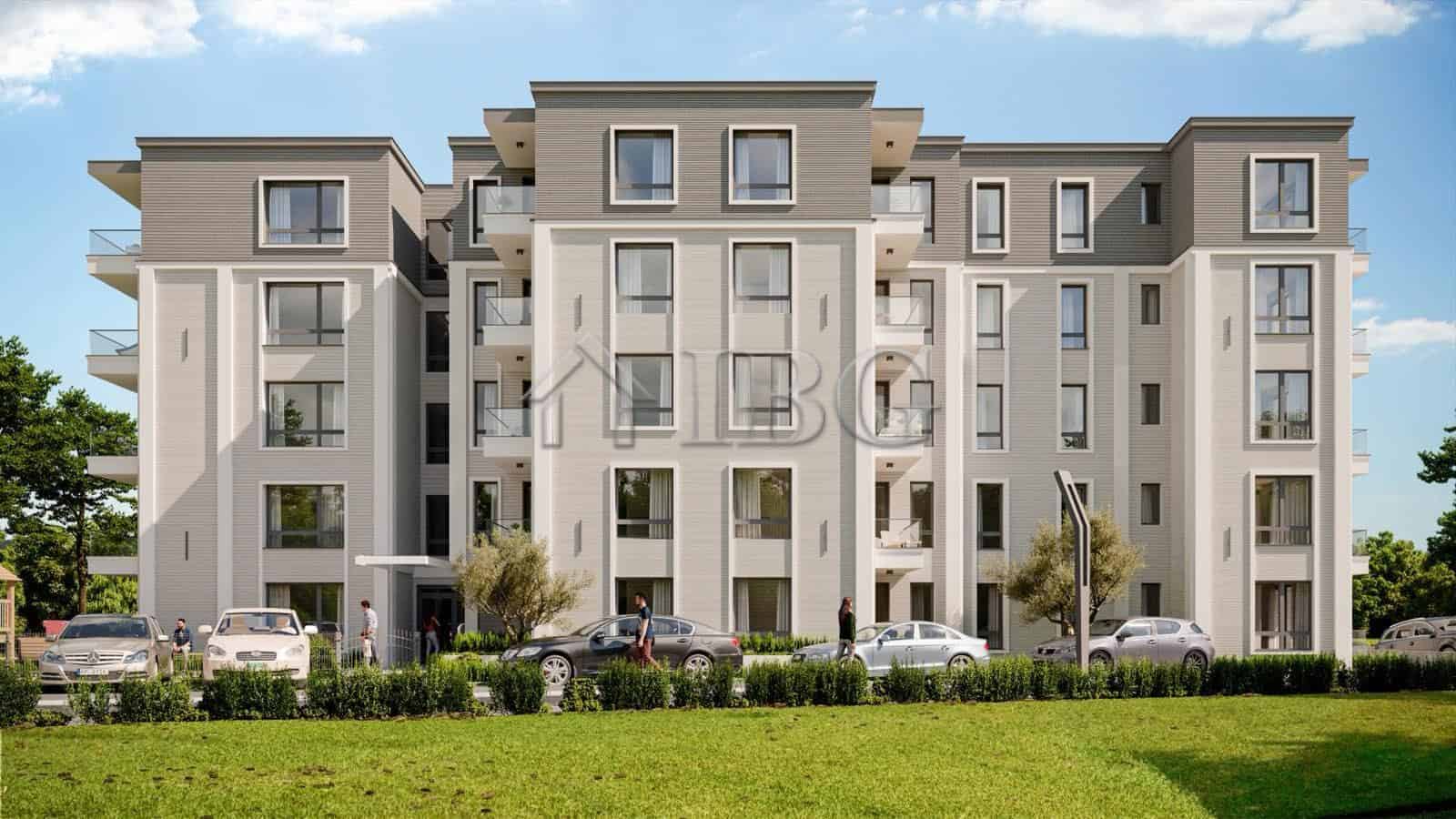 Modern residential building in Ravda with multiple floors and balconies.