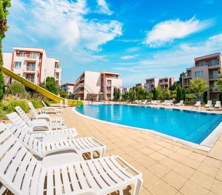 Bright pool view from a 1-bedroom apartment at Nessebar Fort Club, Sunny Beach. Perfect for relaxing.