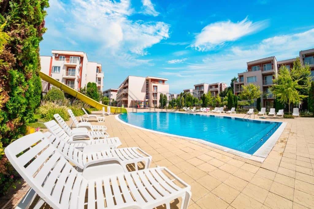 Bright pool view from a 1-bedroom apartment at Nessebar Fort Club, Sunny Beach. Perfect for relaxing.