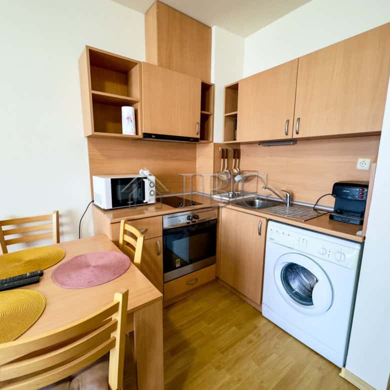 Compact studio apartment for sale in Panorama Bay 1, Sveti Vlas, featuring a functional kitchen and.