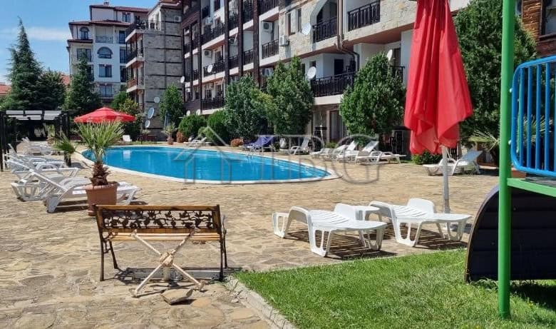 Pool area with sun loungers and umbrellas in Panorama Bay 2, Sveti Vlas.