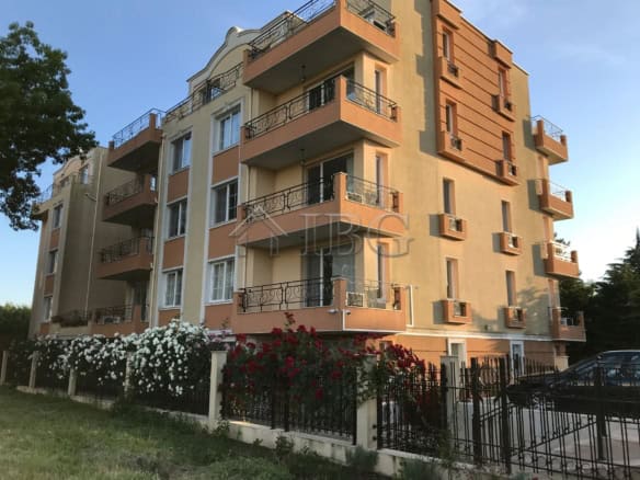 Apartment building with balconies and outdoor spaces in Pomorie Residence.