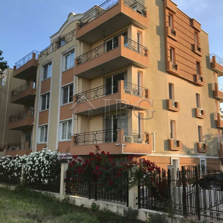 Apartment building with balconies and outdoor spaces in Pomorie Residence.