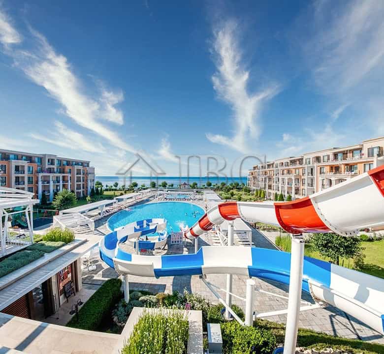 Apartment complex with water slides and pool at Premier Fort Beach, Sveti Vlas.