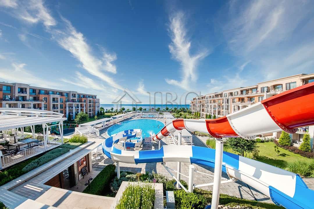 Modern apartment complex with water slides and pool area in Sveti Vlas. Apartment complex with water slides and pool at Premier Fort Beach, Sveti Vlas.