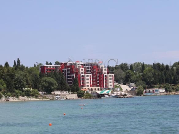 Modern 2-bedroom apartment with direct access to the beach in Nessebar, offering stunning sea views.