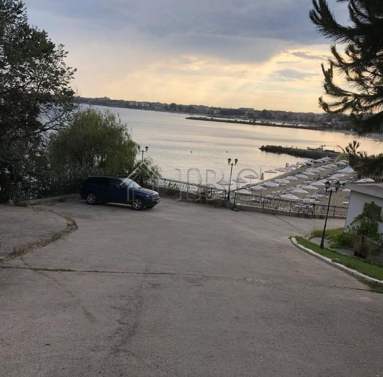 Bright view of Nessebar's beach and calm waters from the apartment. Perfect for seaside living and r.