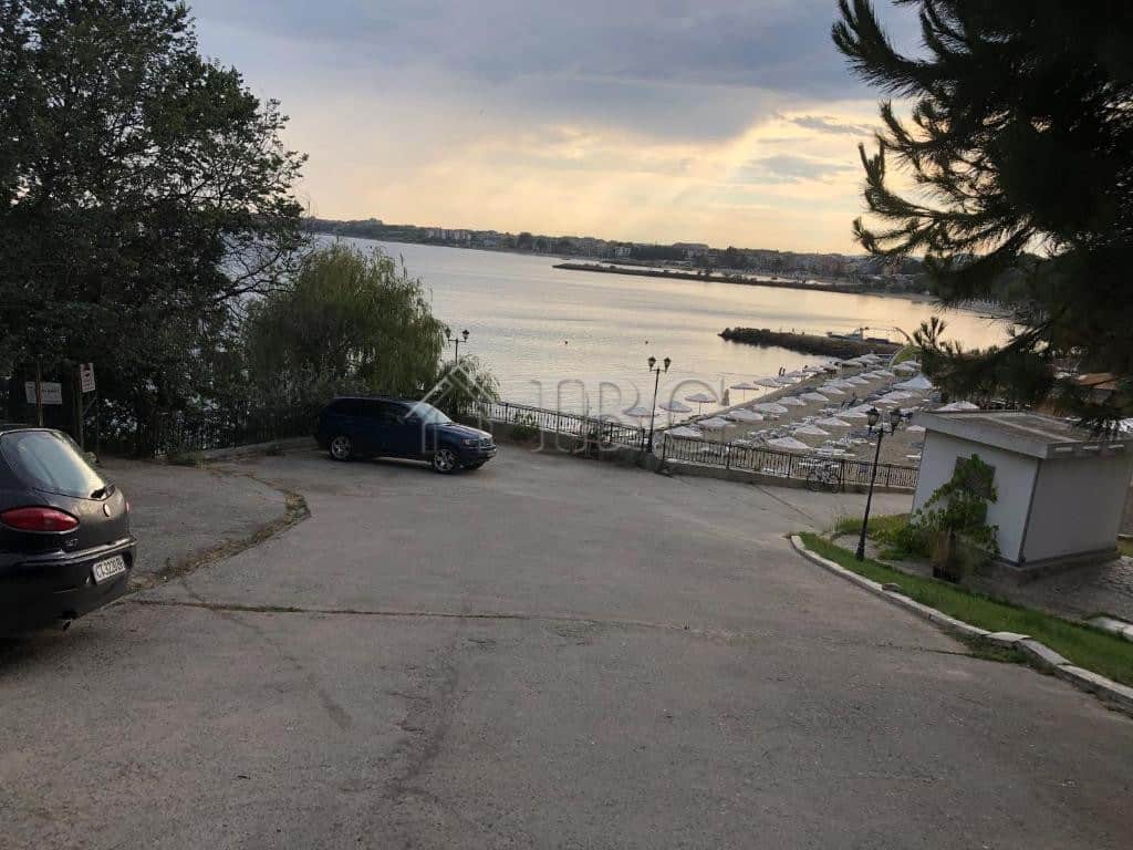 Bright view of Nessebar's beach and calm waters from the apartment. Perfect for seaside living and r.