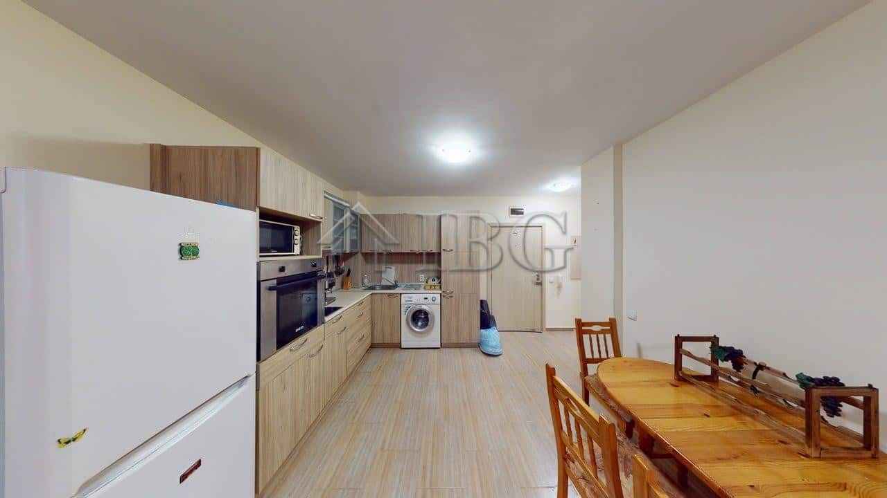 Bright and modern kitchen in a comfortable one-bedroom apartment in Rio.