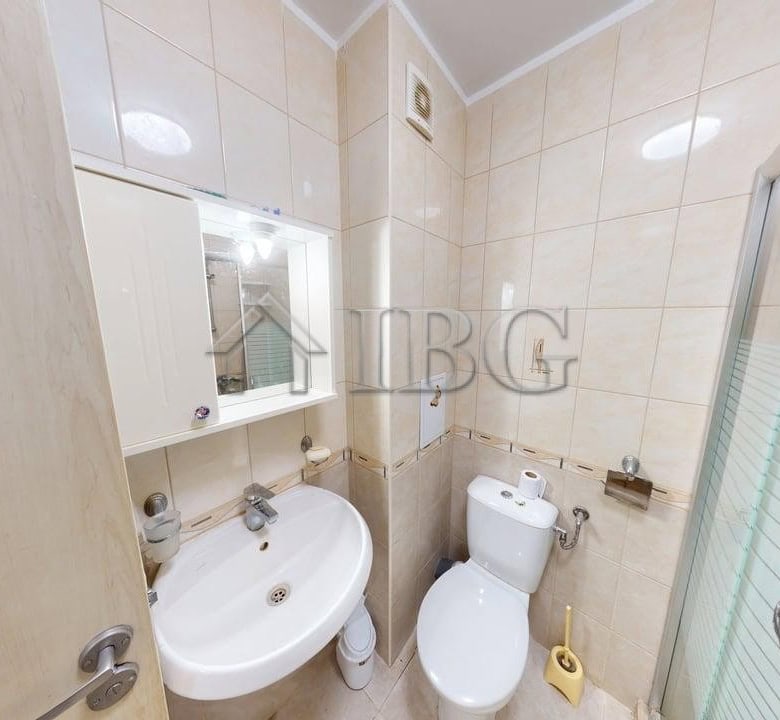Interior view of a one-bedroom apartment bathroom in Rio with modern fixtures.
