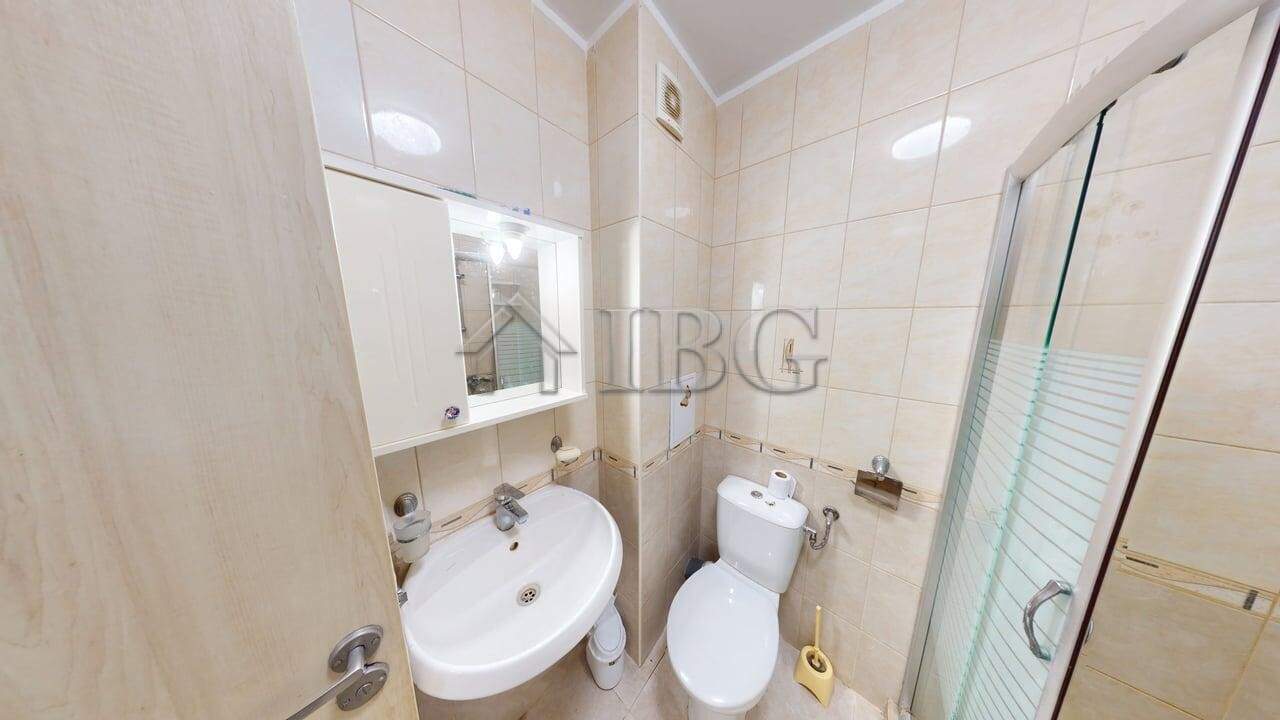 Interior view of a one-bedroom apartment bathroom in Rio with modern fixtures.