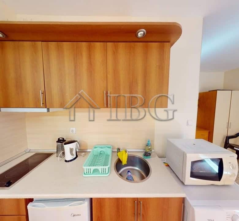 Bright studio apartment with balcony and green yard access in Royal Dreams, Sunny Beach.