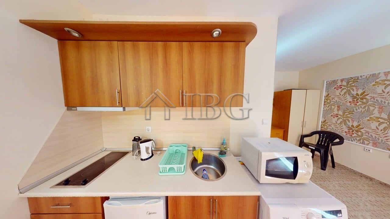 Bright studio apartment with balcony and green yard access in Royal Dreams, Sunny Beach.