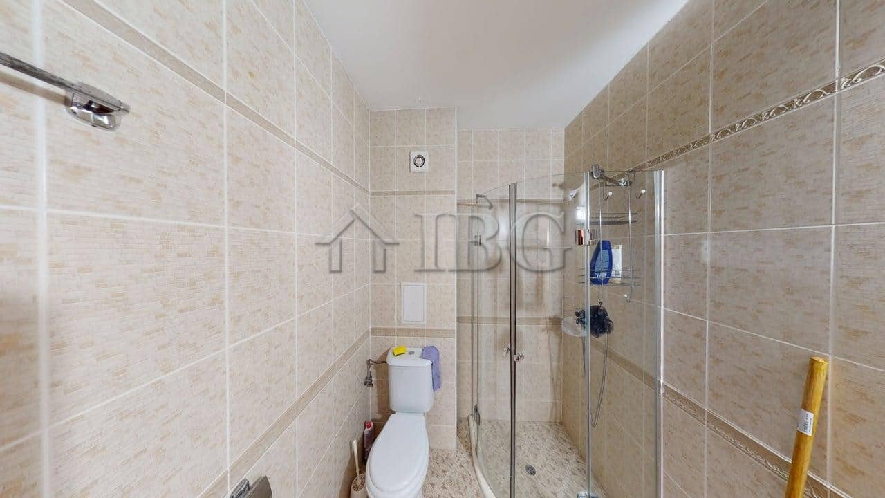 Cozy studio apartment with balcony overlooking lush green yard in Royal Dreams, Sunny Beach.