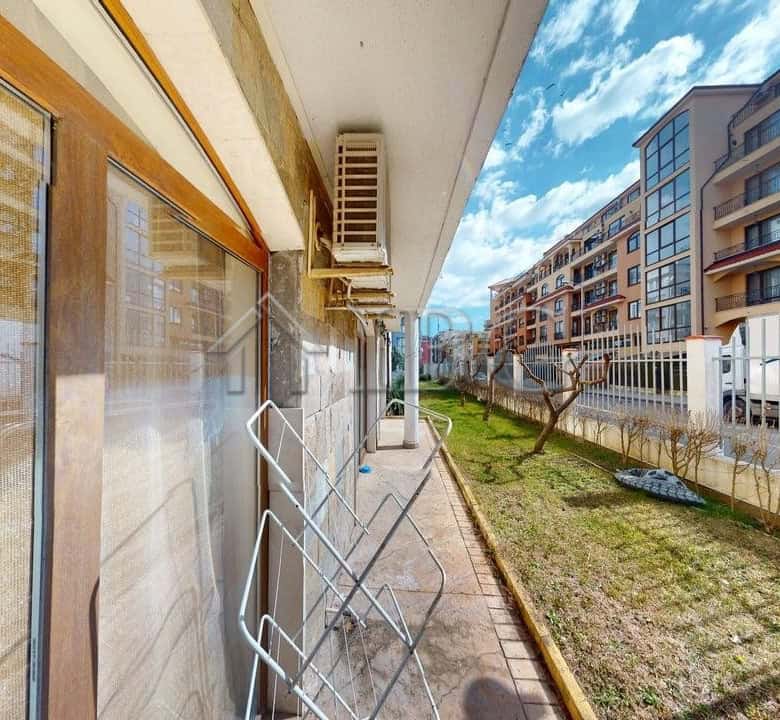 Bright studio apartment with balcony and exit to lush green yard in Royal Dreams, Sunny Beach.