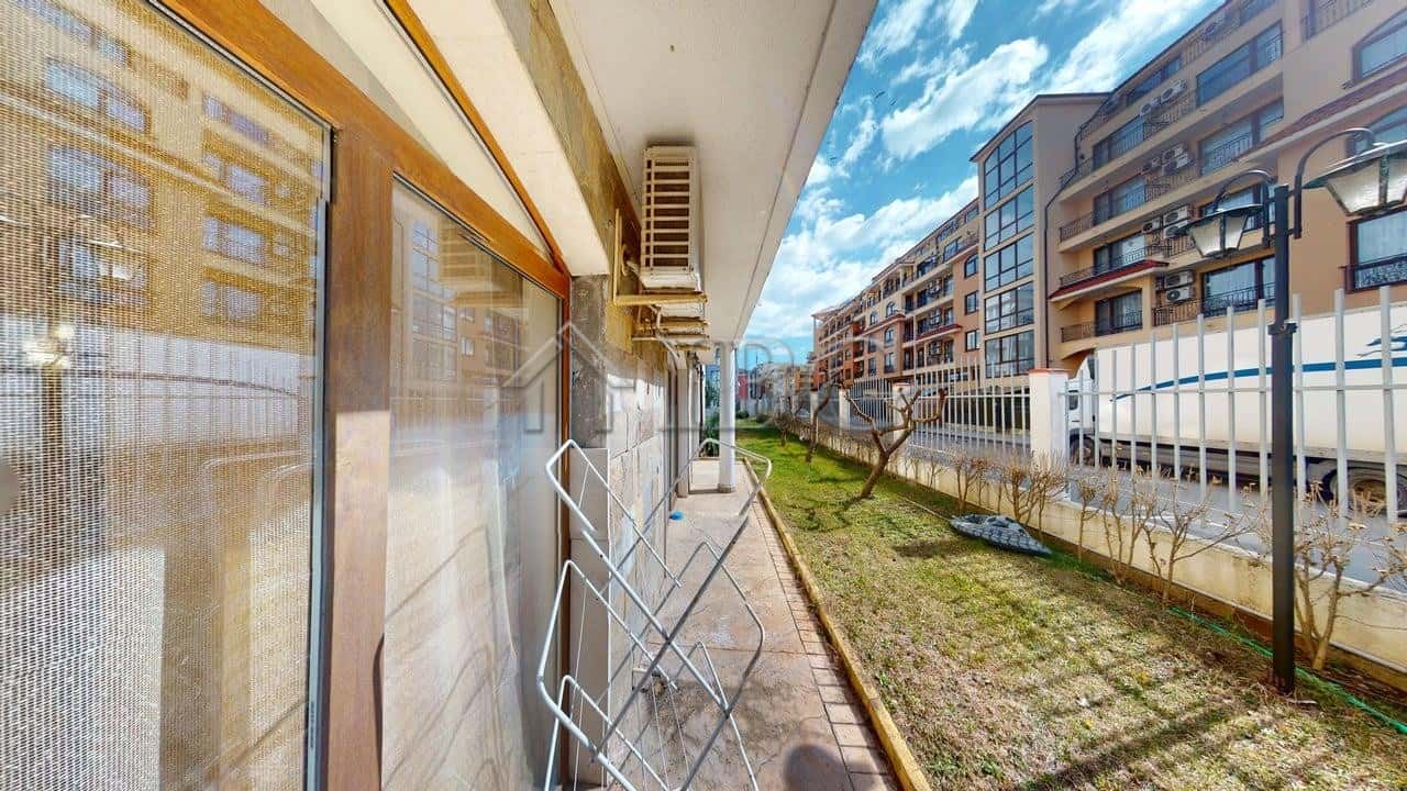 Bright studio apartment with balcony and exit to lush green yard in Royal Dreams, Sunny Beach.
