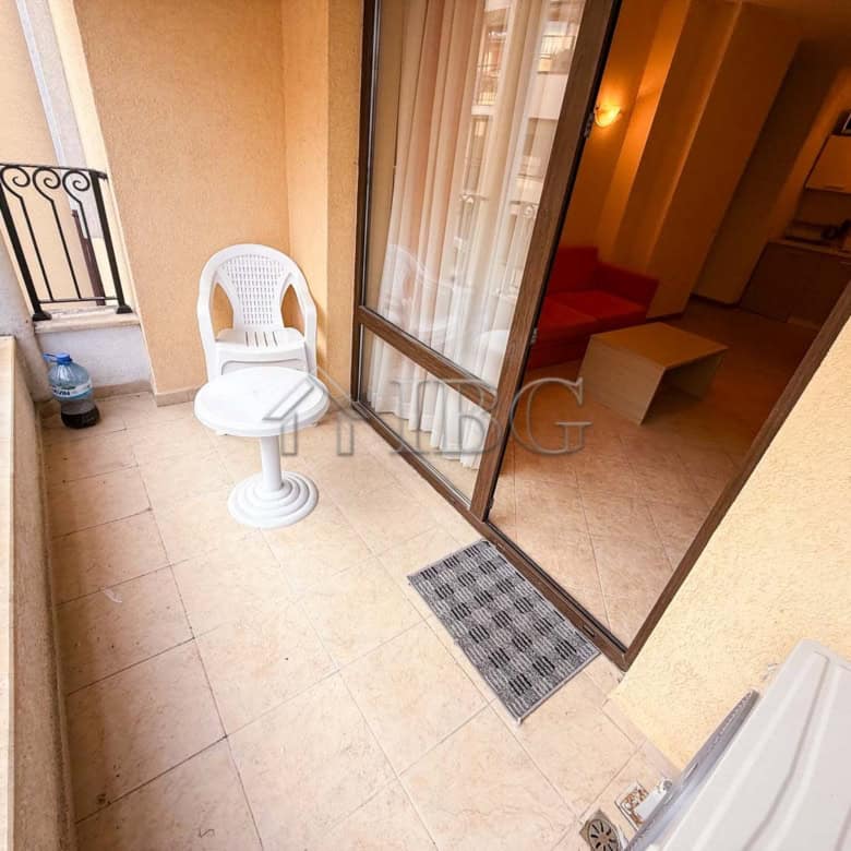Balcony view of a one-bedroom apartment in Royal Sun, Sunny Beach, with outdoor seating and access t.