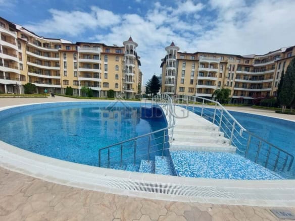 Furnished one-bedroom apartment at Royal Sun, Sunny Beach, featuring a shared swimming pool and scen.