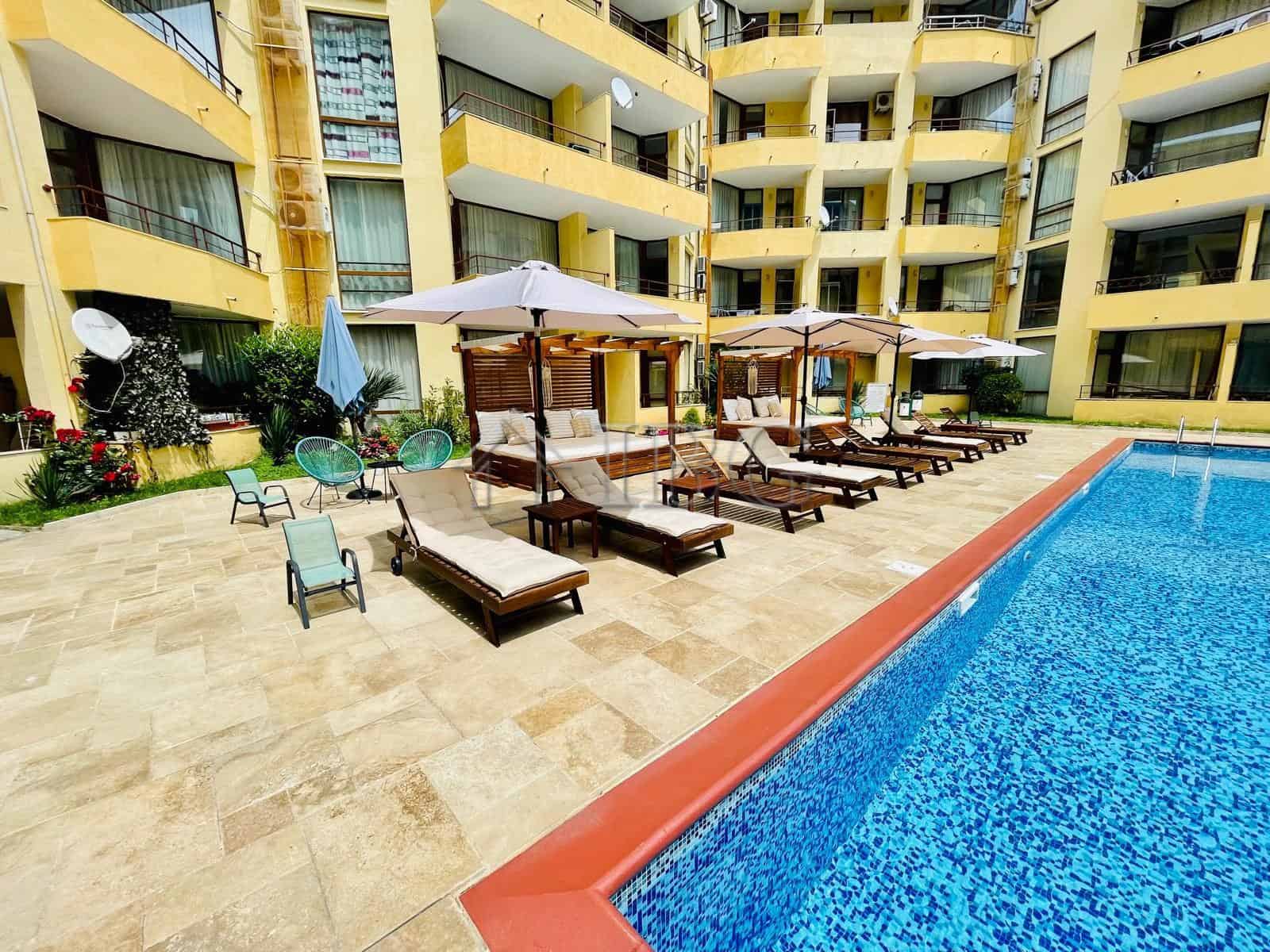 Modern apartment with three balconies overlooking the pool area in Sands Complex, Sunny Beach.