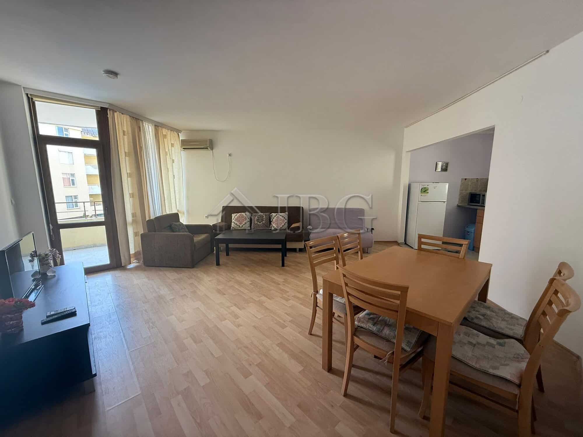 Bright living room with large windows and access to balconies in Sands Complex, Sunny Beach.