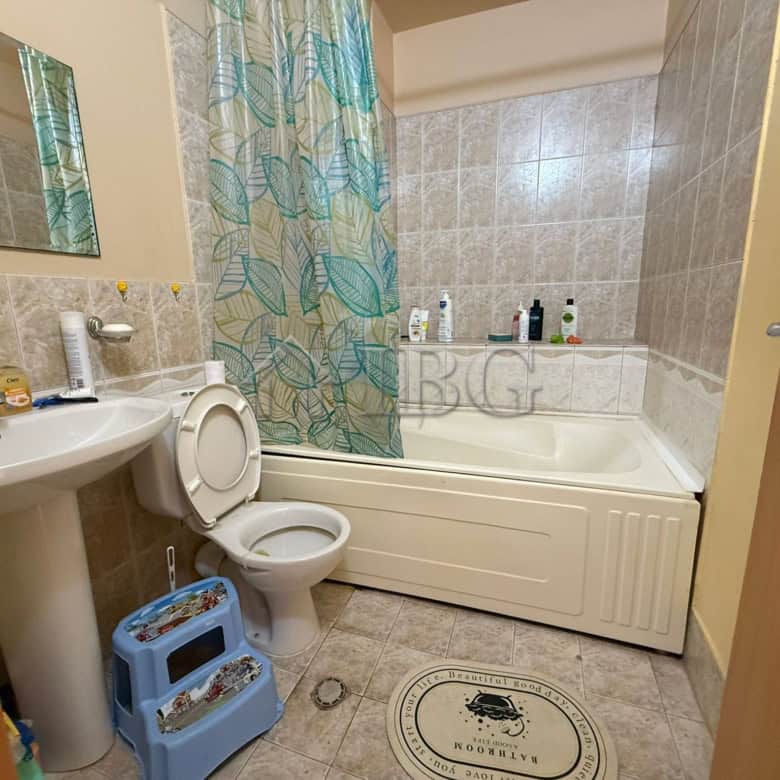 Bright bathroom with bathtub and shower in Sands Complex, Sunny Beach.