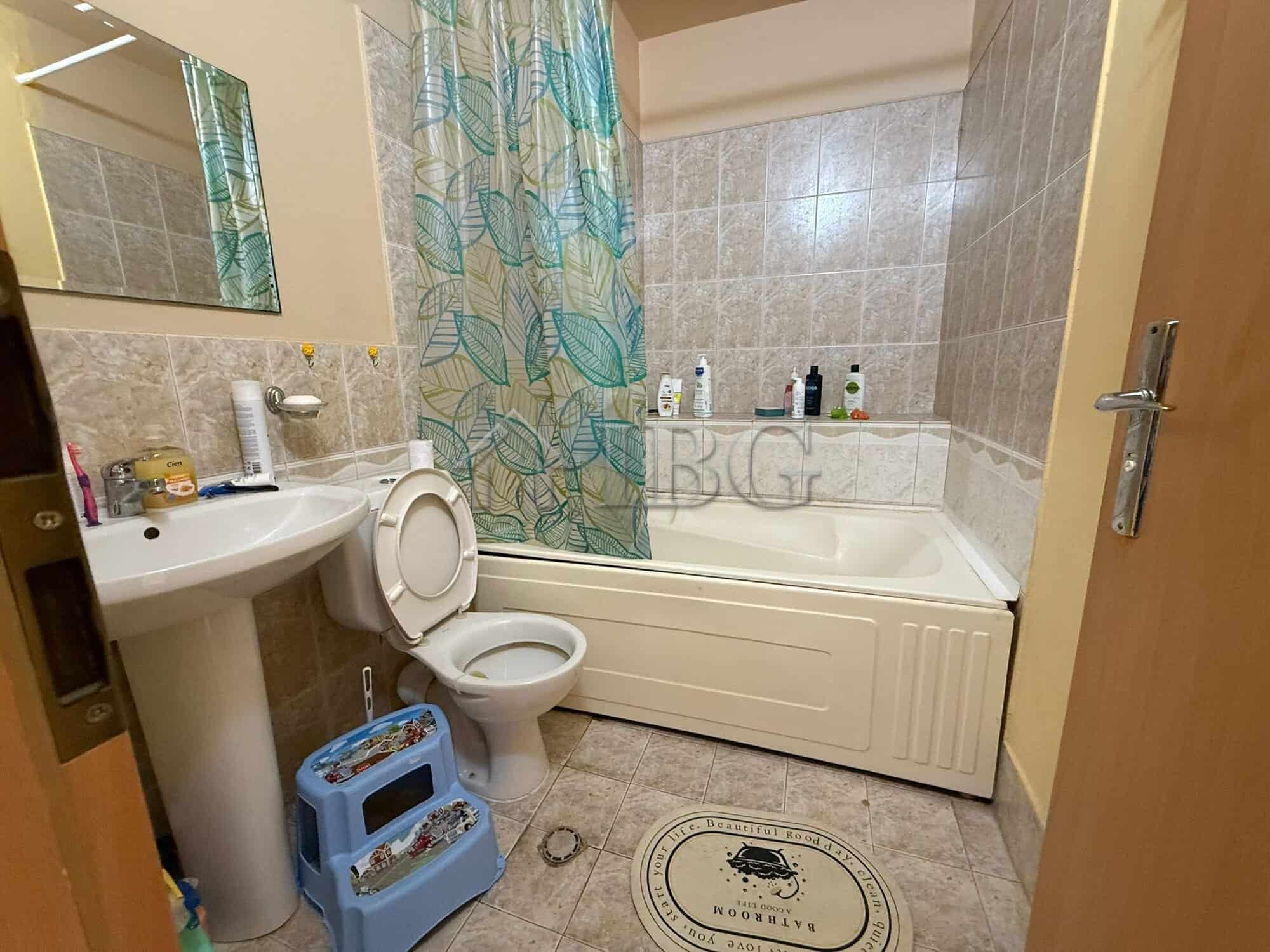 Bright bathroom with bathtub and shower in Sands Complex, Sunny Beach.
