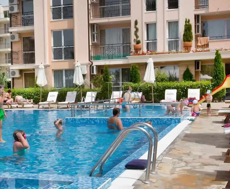 Bright 2-bedroom apartment with pool access in Sunny Beach resort.