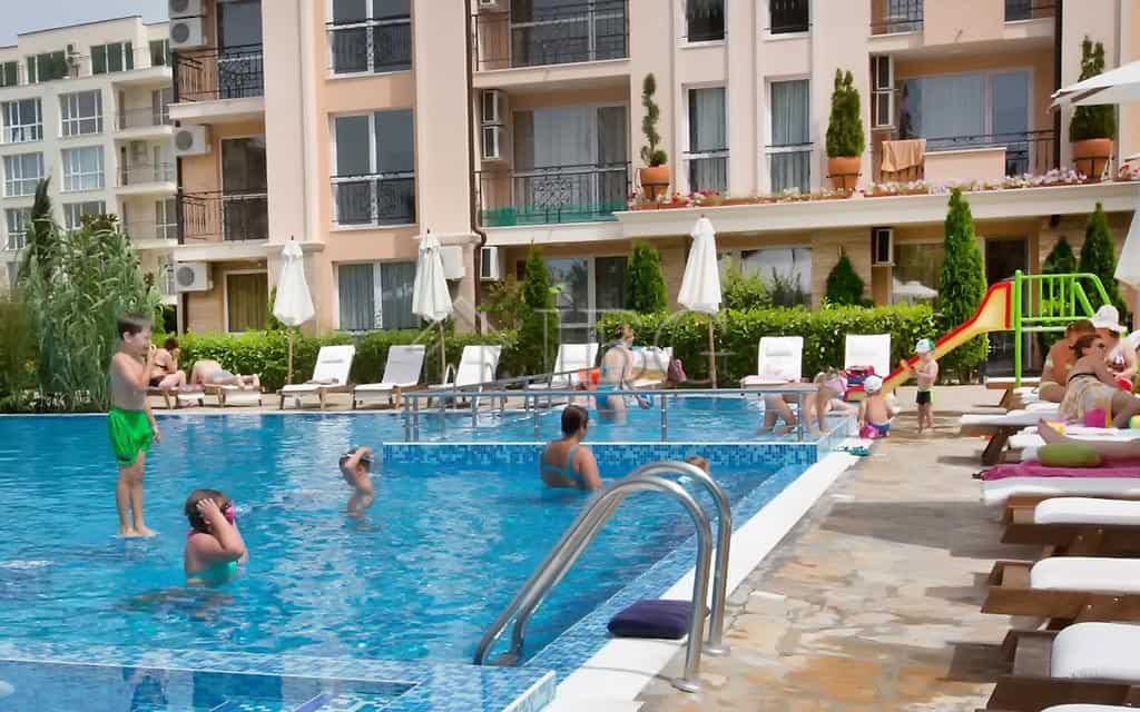 Bright 2-bedroom apartment with pool access in Sunny Beach resort.