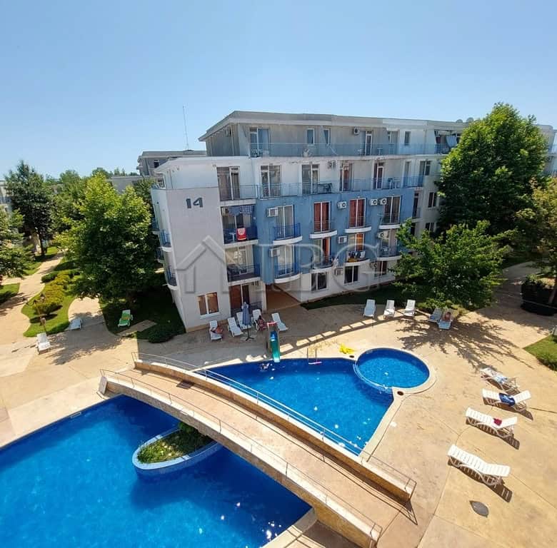 2-Bedroom Sunny Beach Apartment with Pool View.