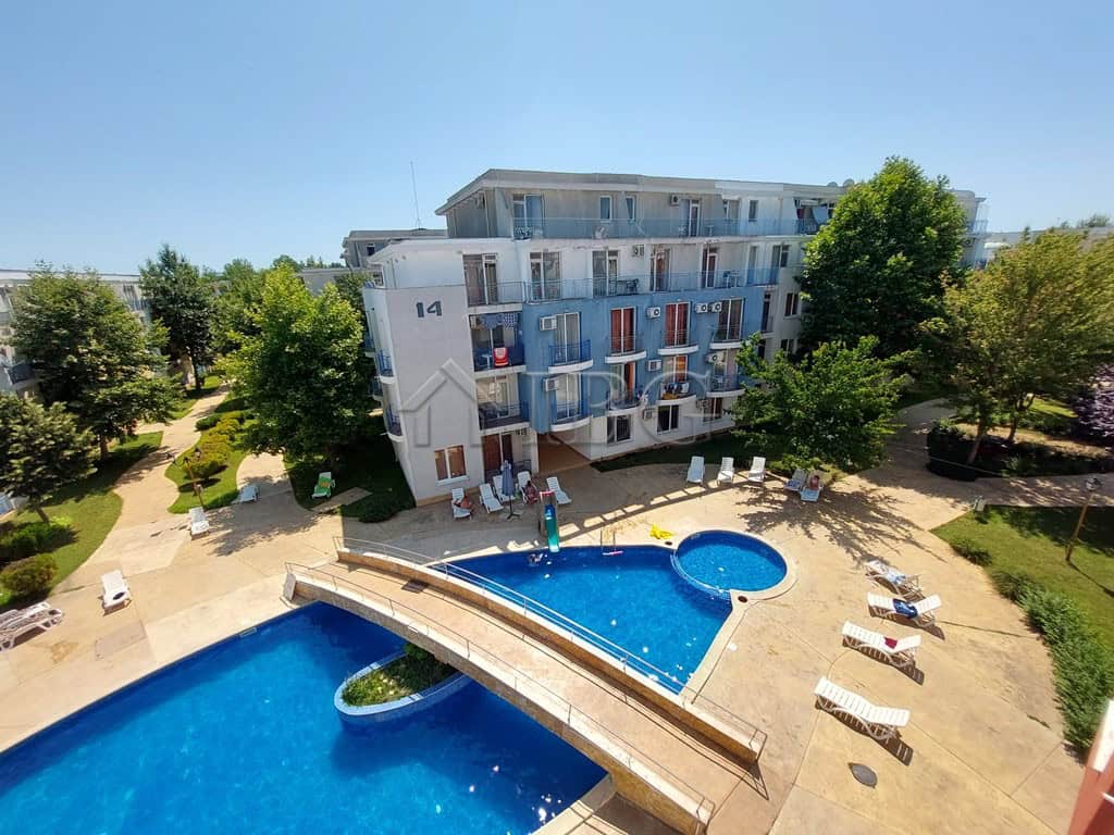 2-Bedroom Sunny Beach Apartment with Pool View.