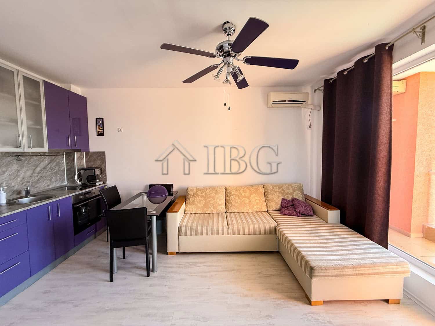 Furnished 2-room apartment for sale near Sunny Beach, Bulgaria, featuring a modern living area with.