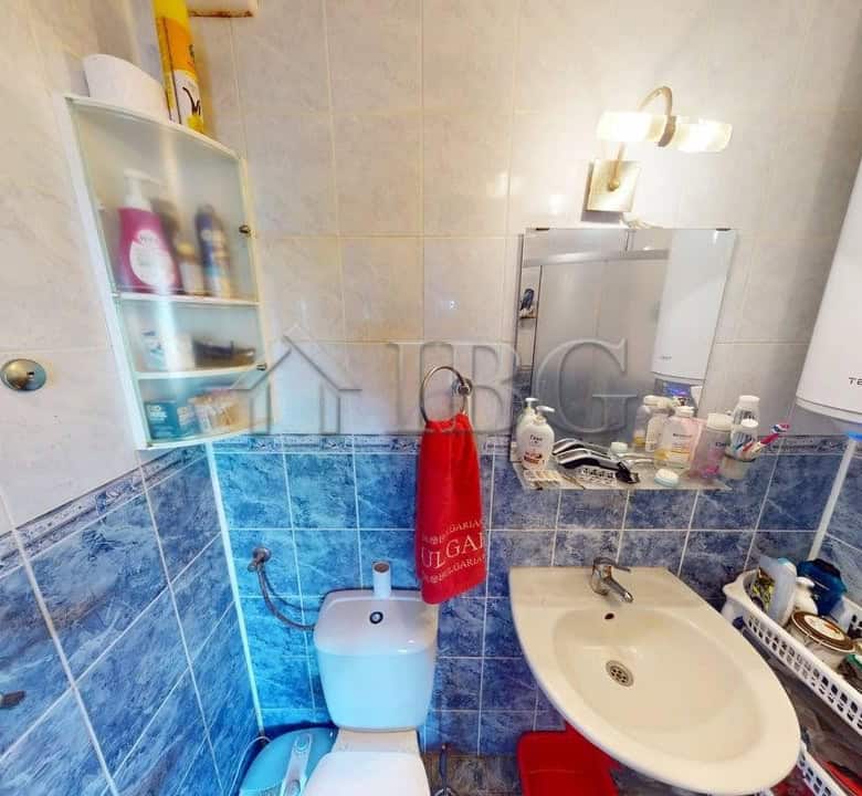 Interior view of a compact bathroom in a two-bedroom apartment at Sunny House Complex, Kosharitsa.