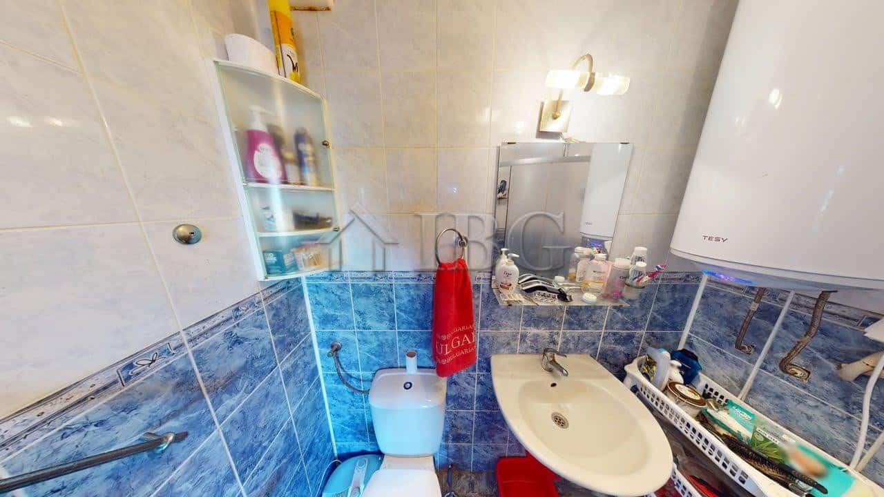 Interior view of a compact bathroom in a two-bedroom apartment at Sunny House Complex, Kosharitsa.
