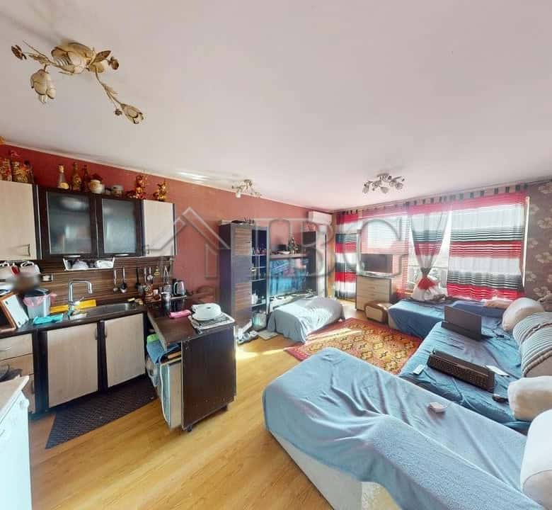 Spacious two-bedroom apartment in Sunny House Complex, Kosharitsa, with modern furnishings and brigh.