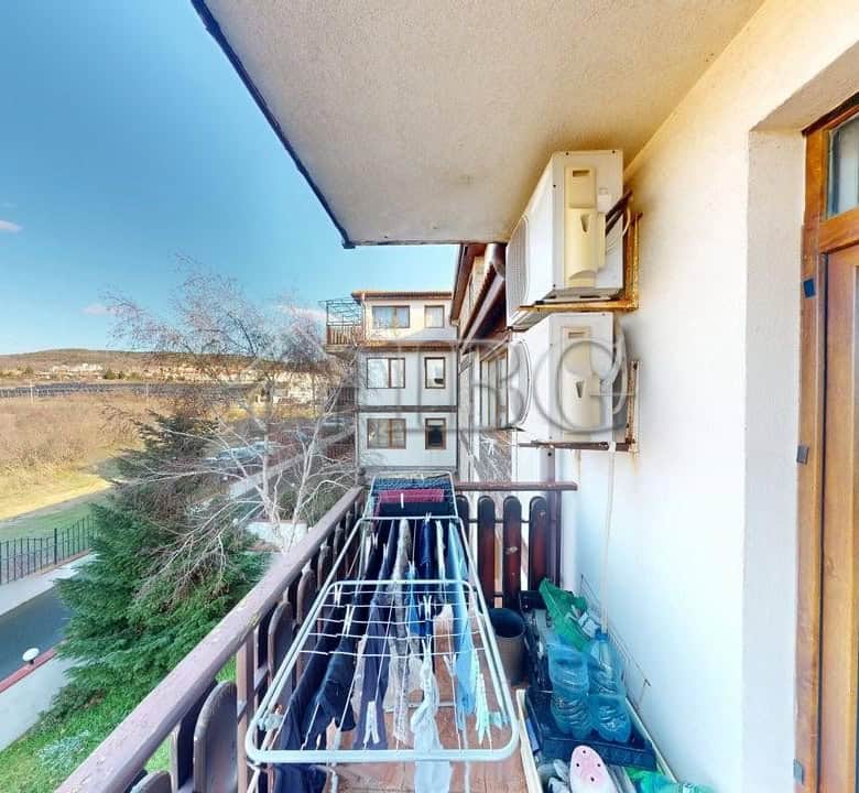 Balcony view from a two-bedroom apartment in Sunny House Complex, Kosharitsa, Bulgaria.