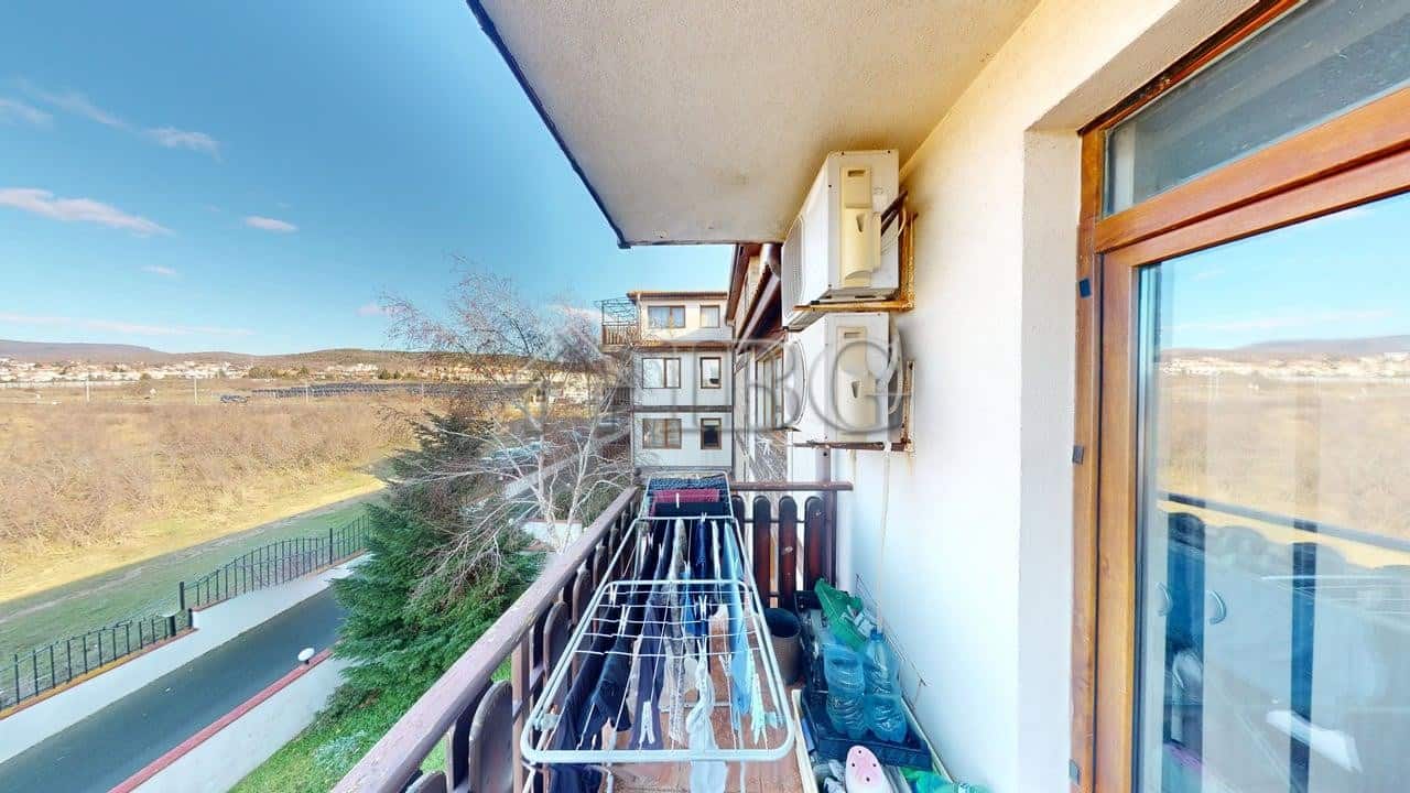 Balcony view from a two-bedroom apartment in Sunny House Complex, Kosharitsa, Bulgaria.
