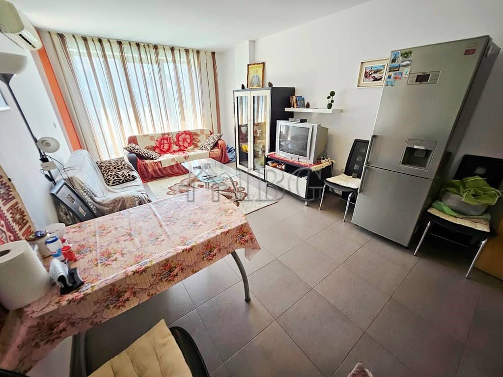 Cozy living room with pool and sunny views, 2-bedroom apartment in Sunny Beach.