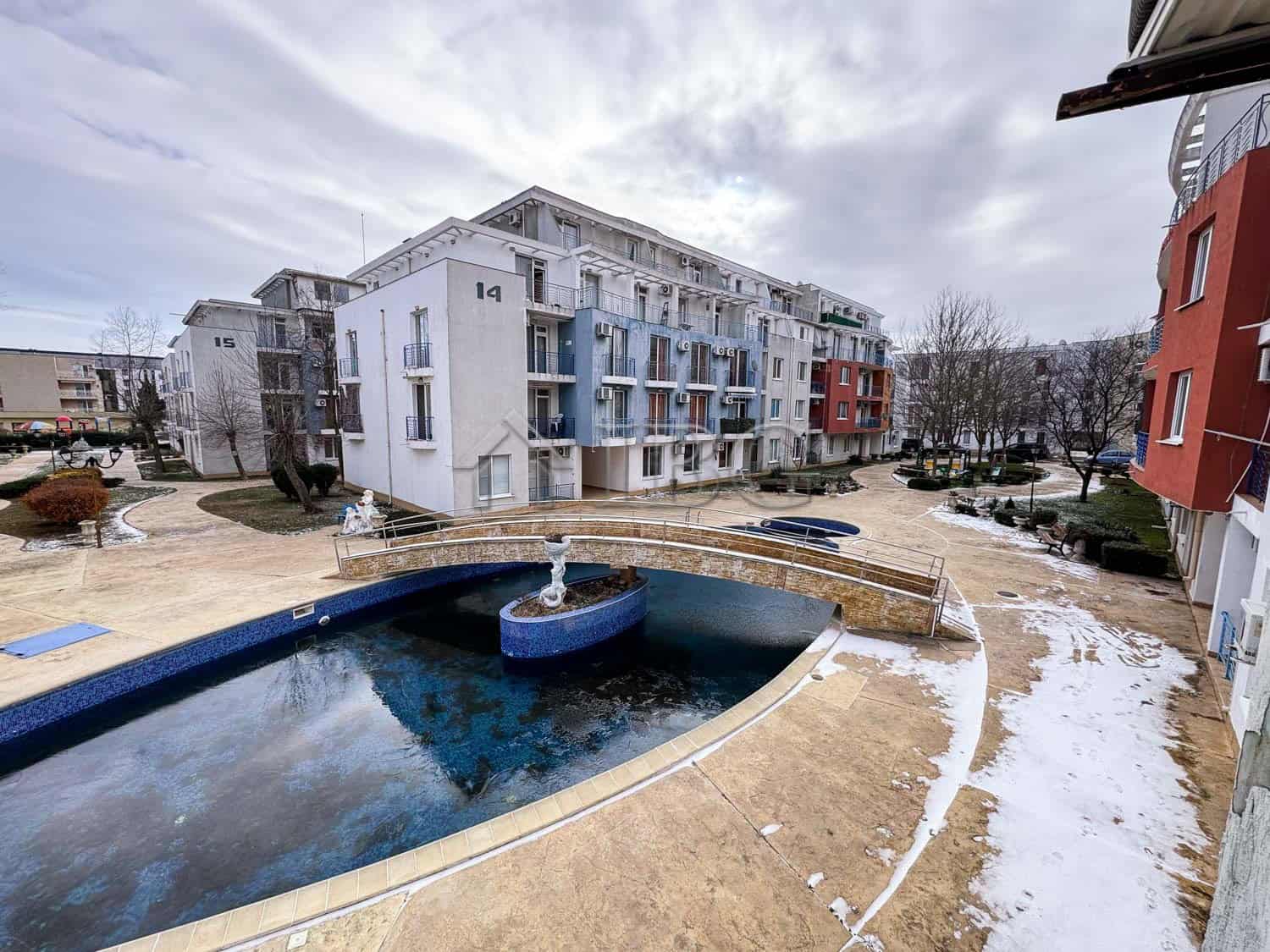 Pool view of a modern cozy studio apartment in Sunny Beach.