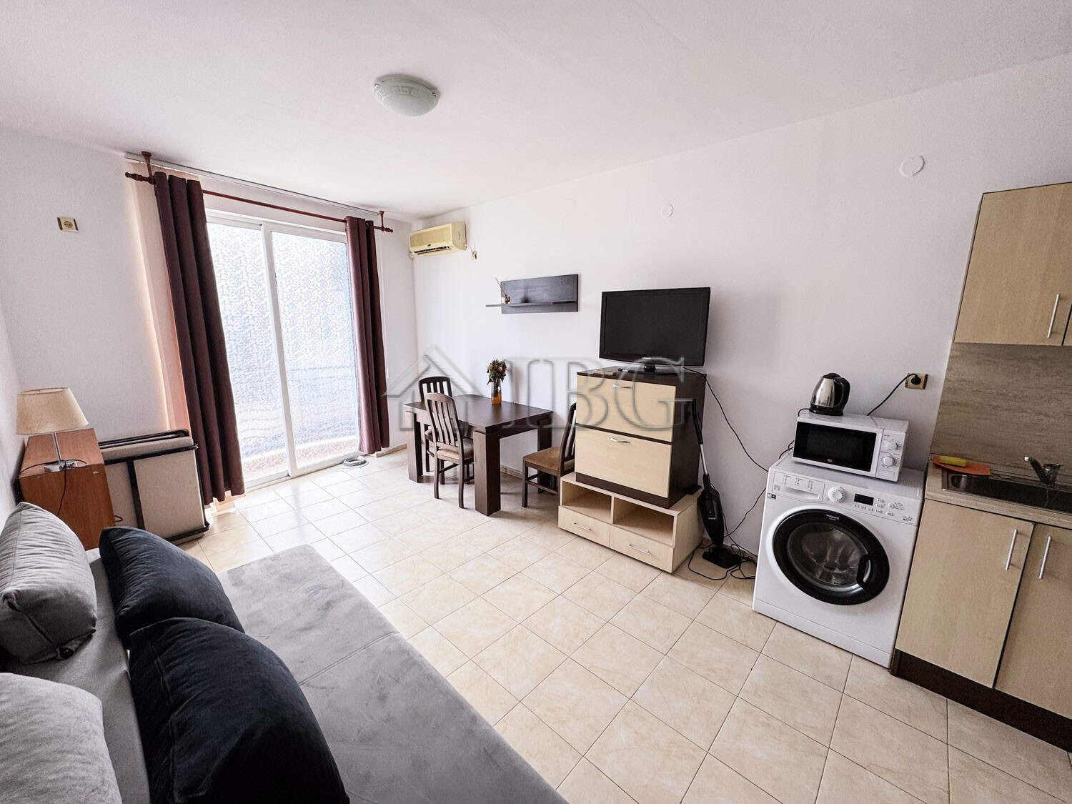 Compact studio apartment with pool view in Sunny Beach, perfect for relaxing holidays.