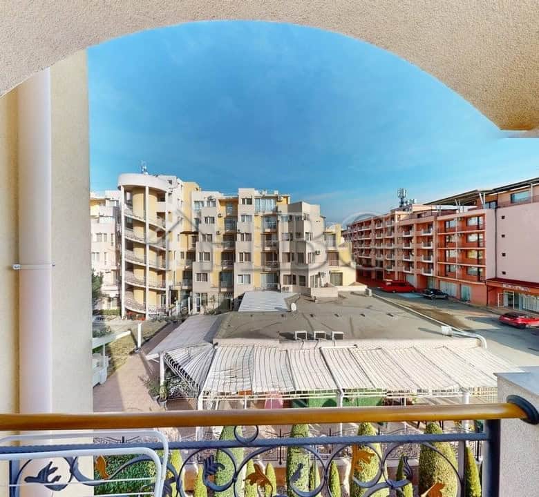 Bright view of Sunny Beach from a one-bedroom apartment balcony.